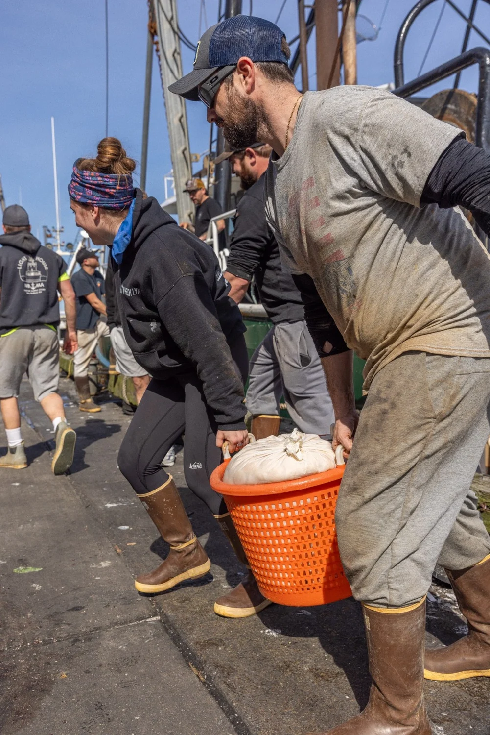 Red’s Best crew handling seafood on the working waterfront